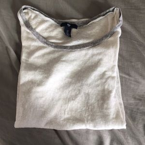 White gap shirt with gray around sleeve and collar